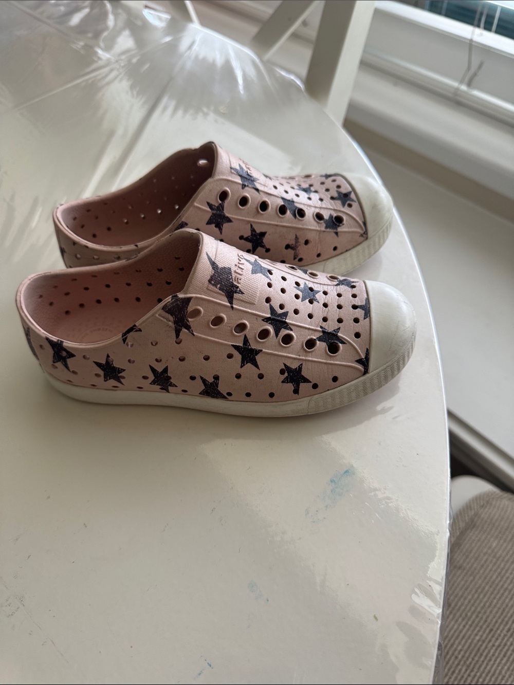 Native Shoes Pink Slip-On Sneakers with Black Star Print